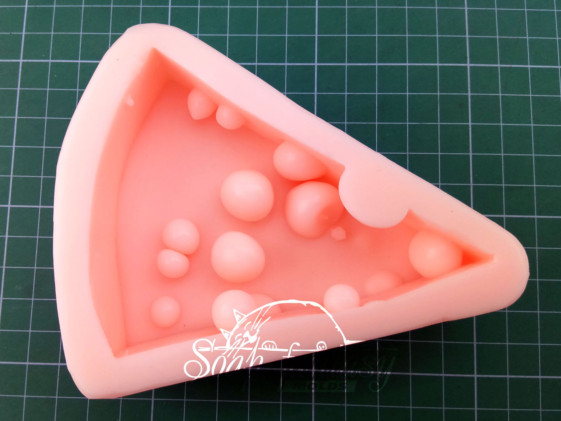 A piece of cheese silicone mold (mould) for soap making and candle making