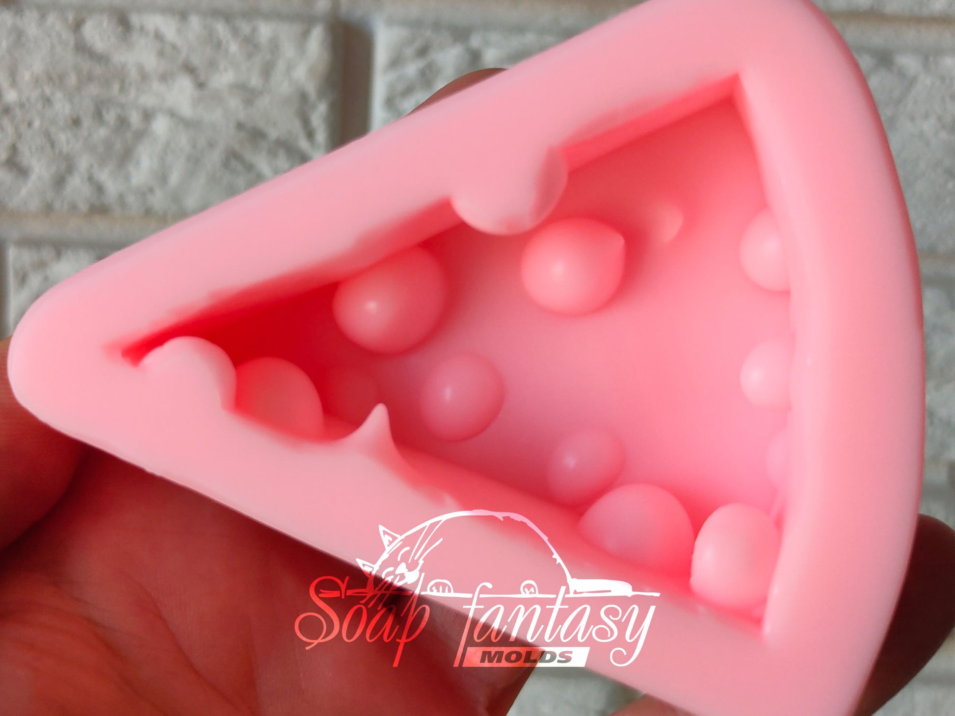 A piece of cheese silicone mold (mould) for soap making and candle making