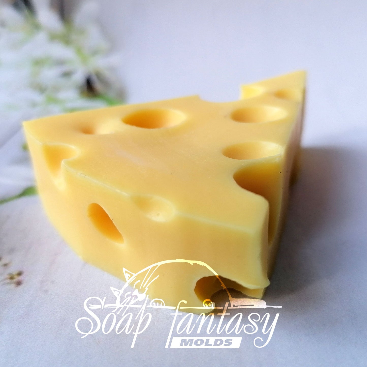 A piece of cheese silicone mold (mould) for soap making and candle making