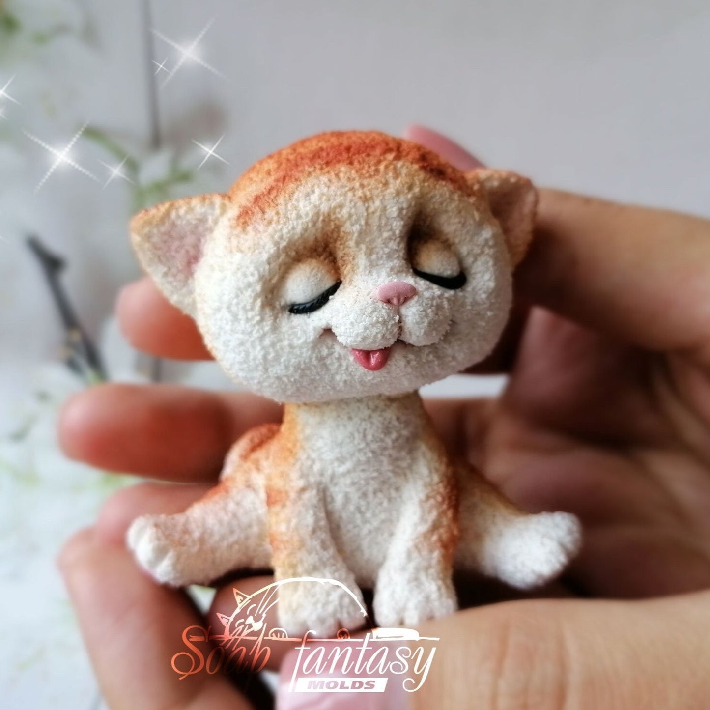 Cat squinting sun silicone mold (mould) for soap making and candle making.