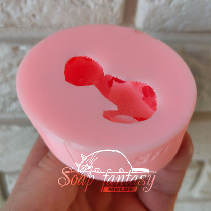 Kitten purr-purr lies on the back silicone mold for soap making