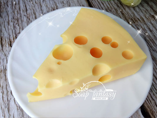 A piece of cheese silicone mold for soap making (without decor)